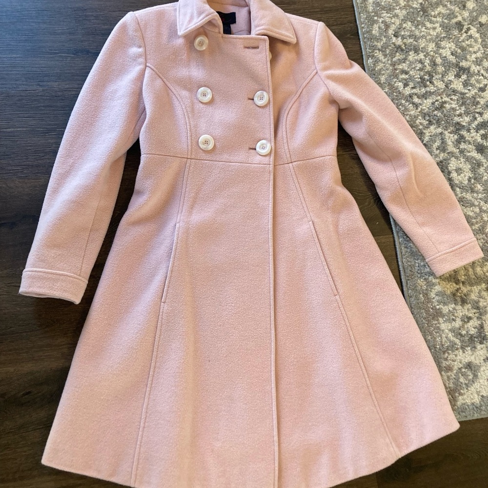 Women’s knee length Pink pea coat. Pockets and 6 buttons